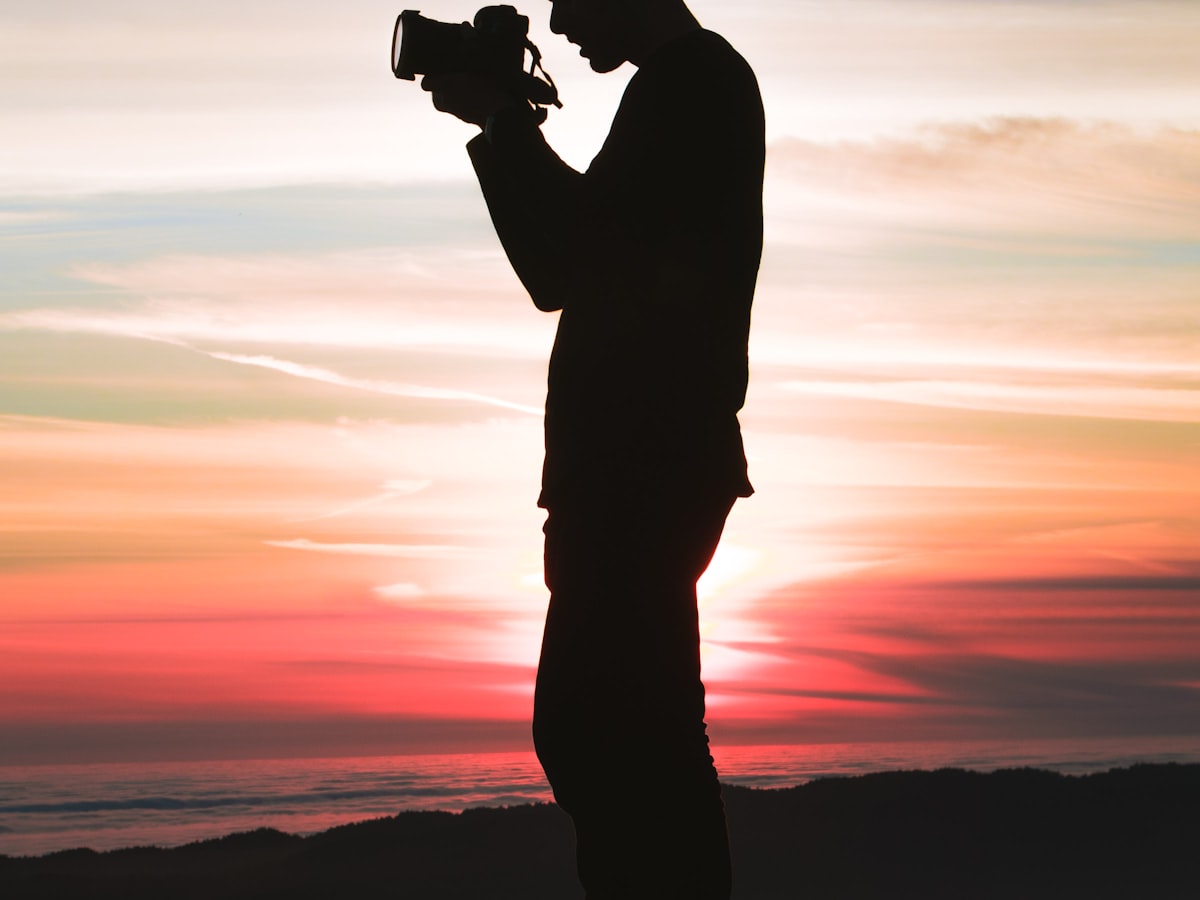 Photographer shooting on location at dusk